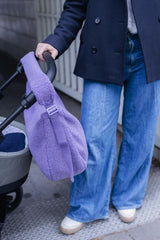 Wickeltasche am Kinderwagenhenkel mit breitem verstellbaren Schultergurt